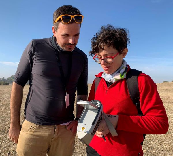 Eleonora Montanari and colleague Derek Pitman check the results of pXRF survey at Madinat al-Zahra
